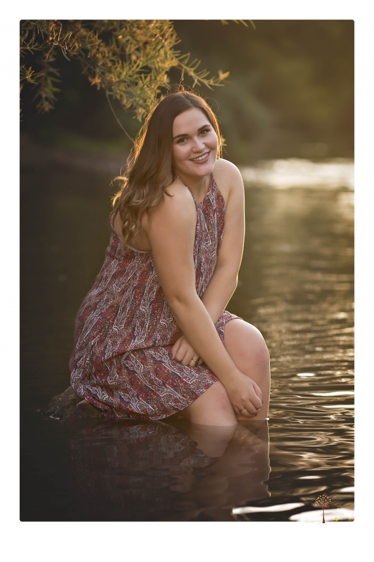 Sonora senior portrait photographer Christine Dibble Photography takes senior portraits of an Orestimba High School student at Knights Ferry in the river.