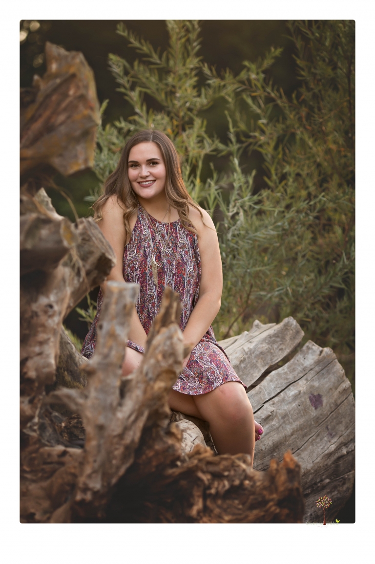 Sonora senior portrait photographer Christine Dibble Photography takes senior portraits of an Orestimba High School student at Knights Ferry in the river.