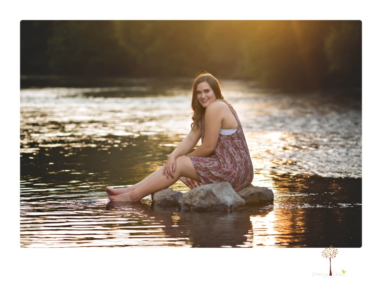 Sonora senior portrait photographer Christine Dibble Photography takes senior portraits of an Orestimba High School student at Knights Ferry in the river.