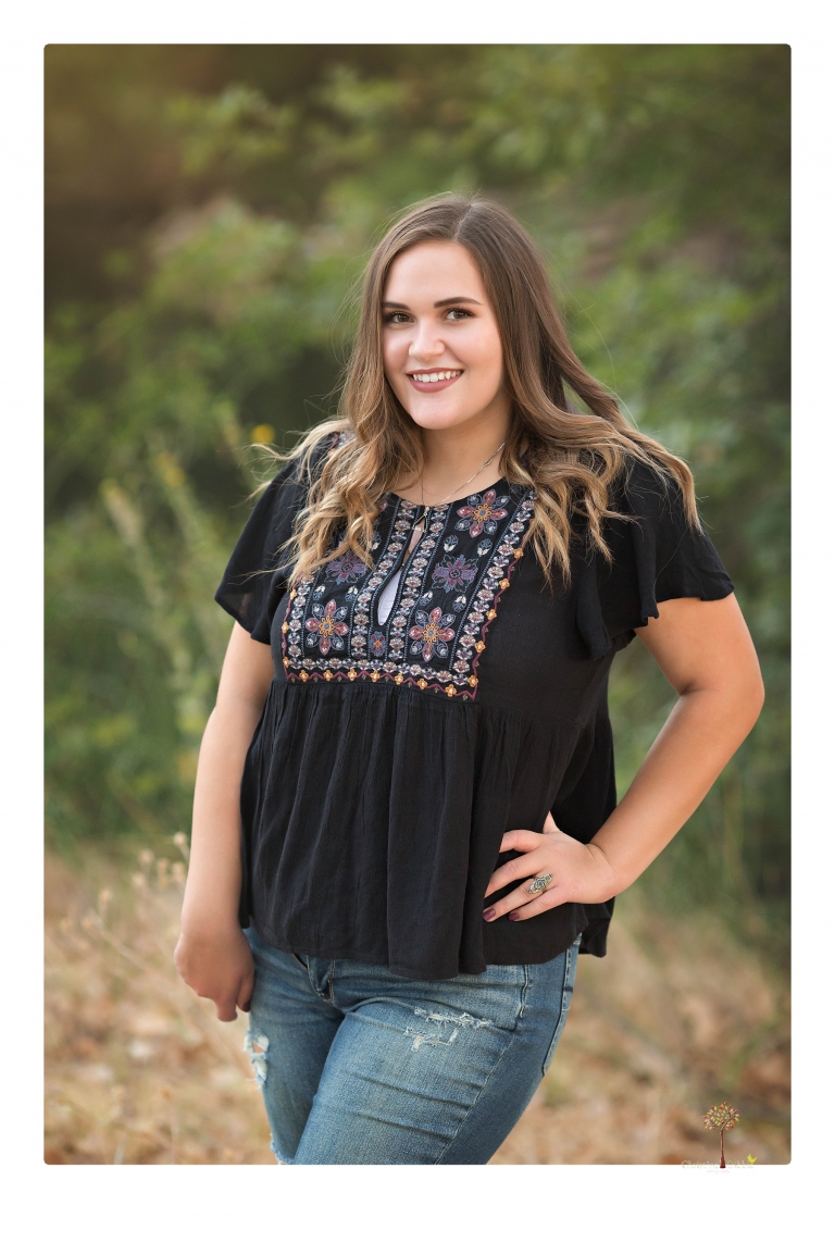 Sonora senior portrait photographer Christine Dibble Photography takes senior portraits of an Orestimba High School student at Knights Ferry in the river.