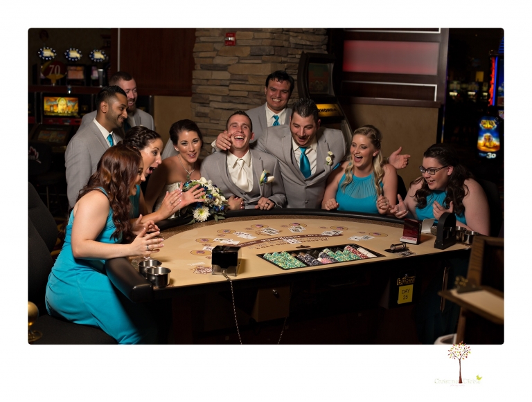 Sonora Wedding Photographer Christine Dibble Photography takes photos of the bridal party in the Black Oak Casino Players Club area.
