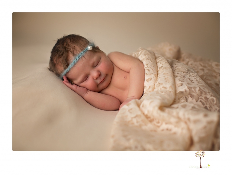 Sonora Newborn Photographer Christine Dibble Photography takes newborn studio portraits of babies and their parents and families with various vintage props.