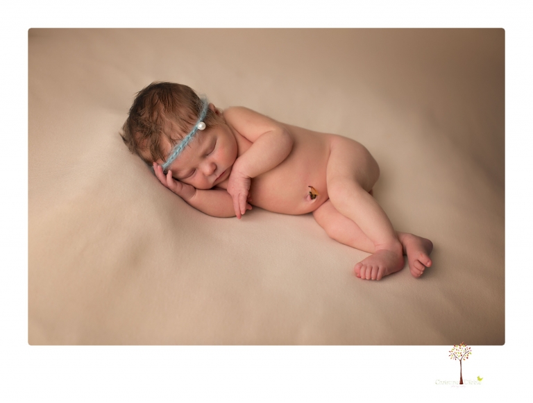Sonora Newborn Photographer Christine Dibble Photography takes newborn studio portraits of babies and their parents and families with various vintage props.