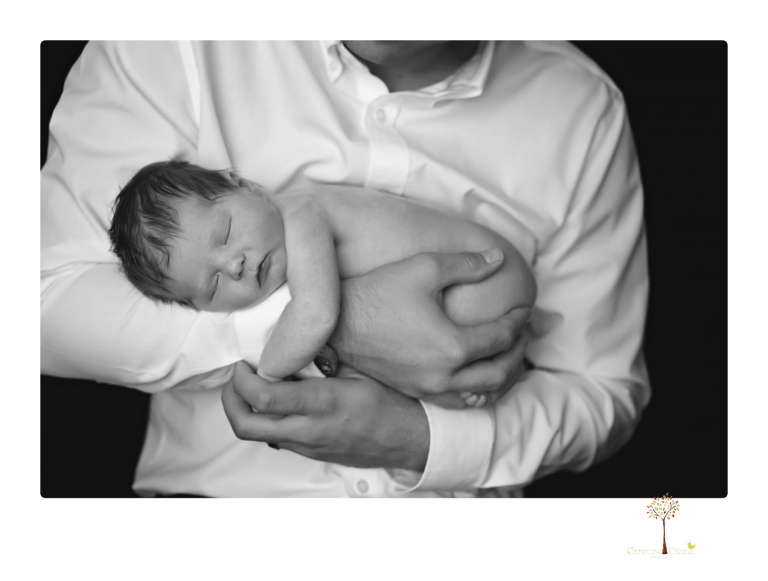 Sonora Newborn Photographer Christine Dibble Photography takes newborn studio portraits of babies and their parents and families with various vintage props.