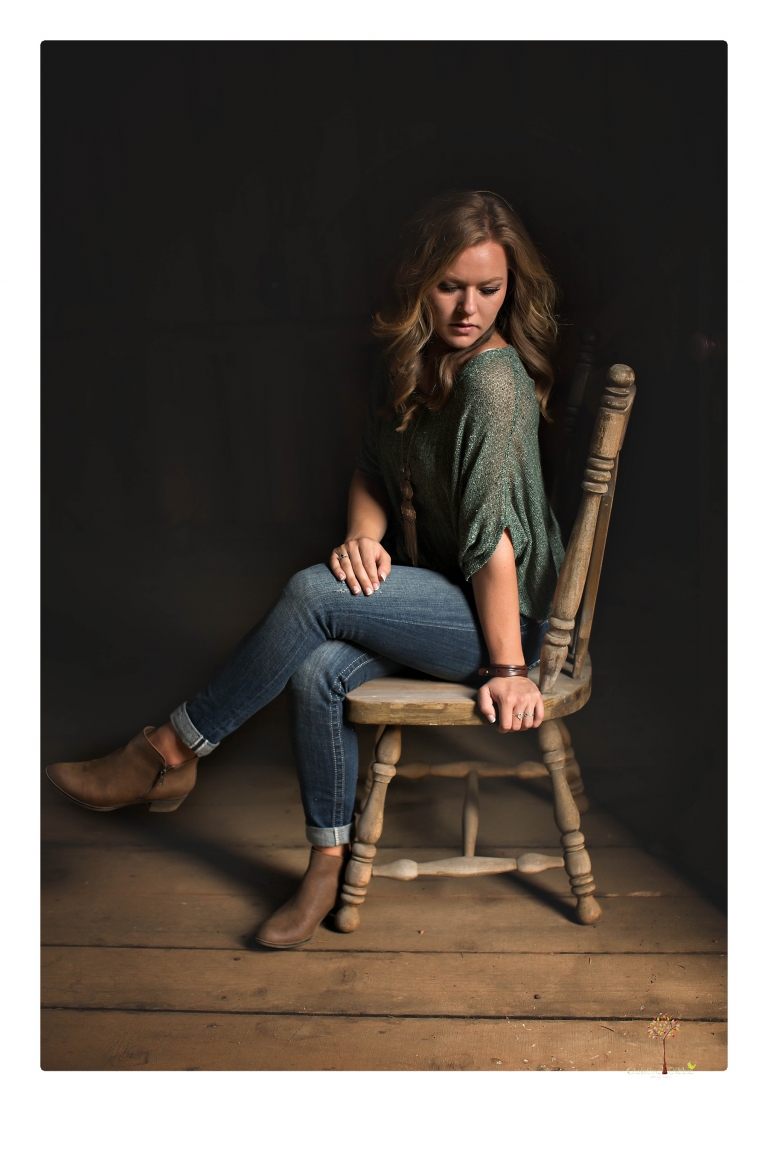 Summerville High senior portrait photographer Christine Dibble Photography of Sonora takes senior portraits of a girl in a field of wildflowers with her violin.