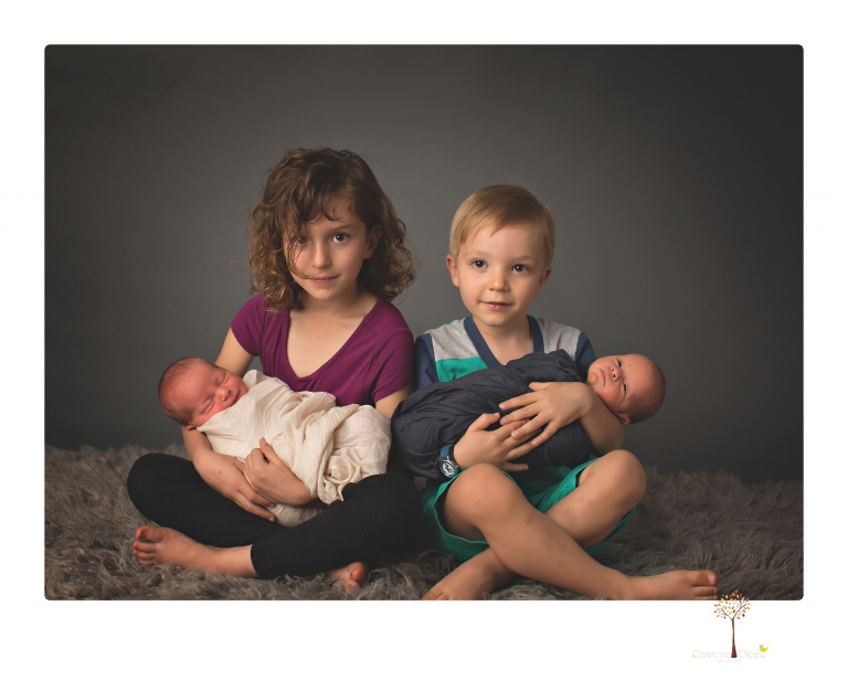 Best Sonora newborn photographer Christine Dibble Photography photographs newborn twins in a newborn portrait session in the studio with both babies posing alone and together.