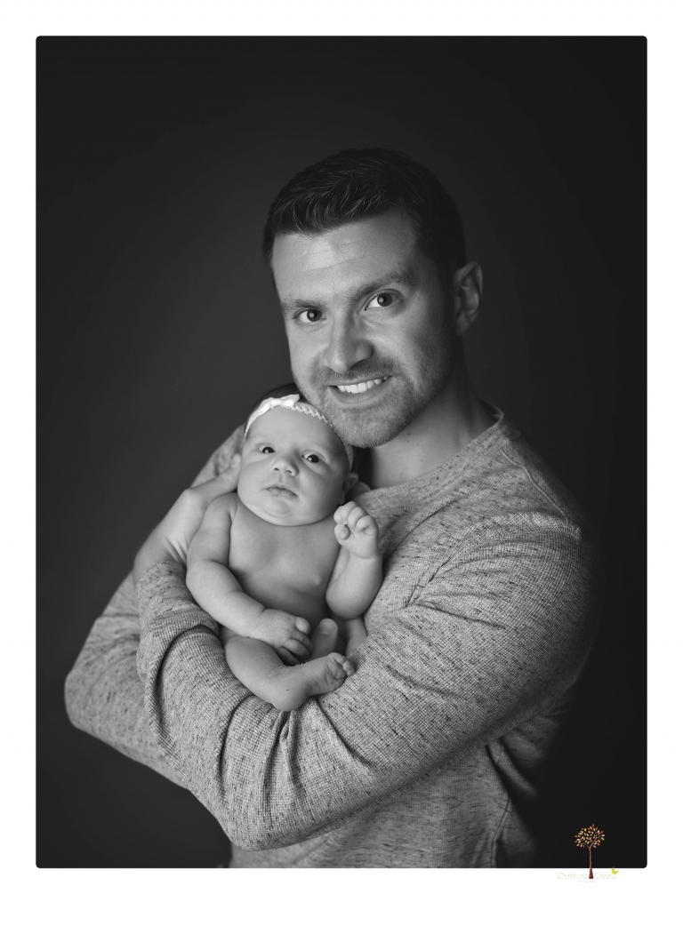 Best Sonora newborn photographer Christine Dibble Photography takes wide awake newborn studio portraits of a baby girl with her parents and in wraps.