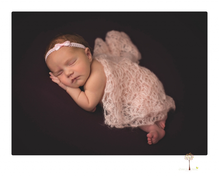 Best Sonora newborn photographer Christine Dibble Photography takes wide awake newborn studio portraits of a baby girl with her parents and in wraps.