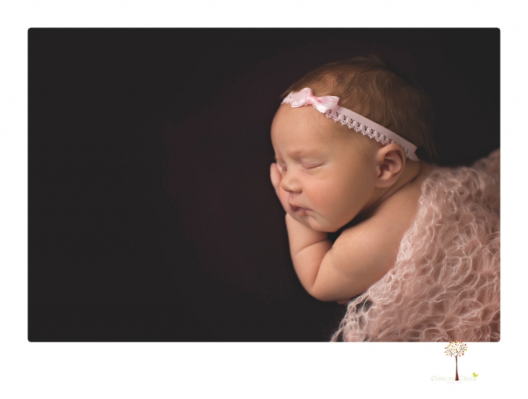 Best Sonora newborn photographer Christine Dibble Photography takes wide awake newborn studio portraits of a baby girl with her parents and in wraps.