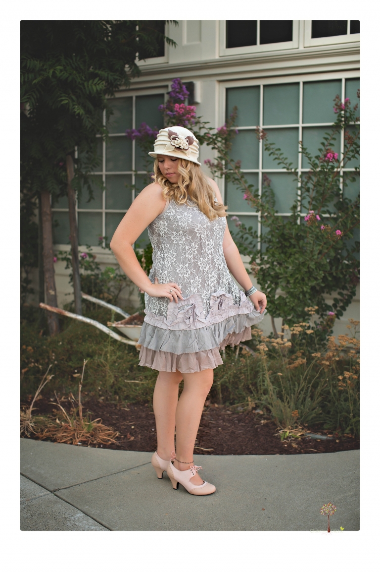 Sonora senior photographer Christine Dibble Photography takes portraits of two cousins dressed as flappers in Copperopolis Town Square before one leaves for college.