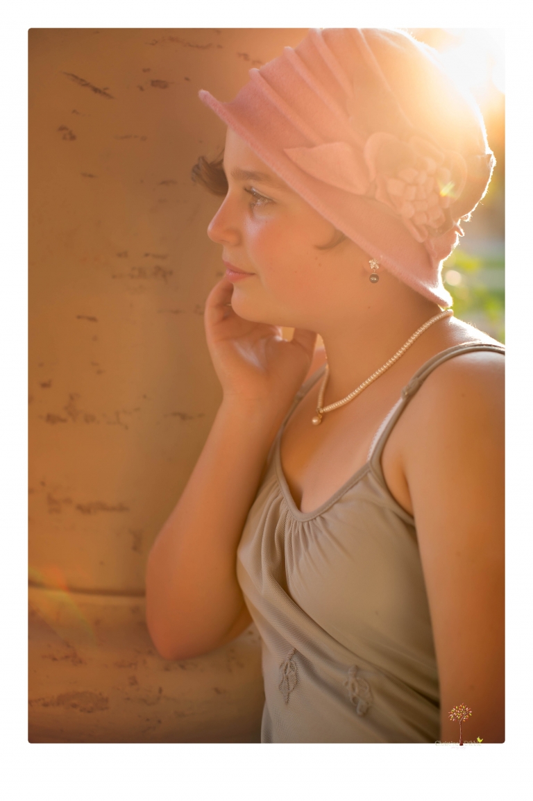 Sonora senior photographer Christine Dibble Photography takes portraits of two cousins dressed as flappers in Copperopolis Town Square before one leaves for college.