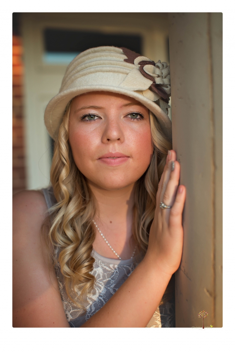 Sonora senior photographer Christine Dibble Photography takes portraits of two cousins dressed as flappers in Copperopolis Town Square before one leaves for college.