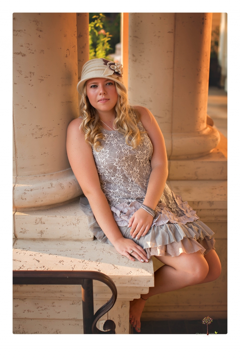 Sonora senior photographer Christine Dibble Photography takes portraits of two cousins dressed as flappers in Copperopolis Town Square before one leaves for college.