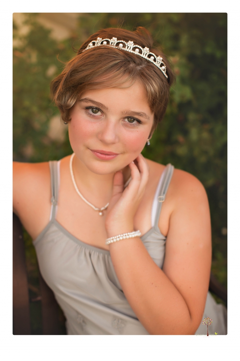 Sonora senior photographer Christine Dibble Photography takes portraits of two cousins dressed as flappers in Copperopolis Town Square before one leaves for college.