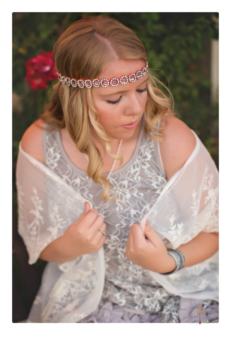 Sonora senior photographer Christine Dibble Photography takes portraits of two cousins dressed as flappers in Copperopolis Town Square before one leaves for college.