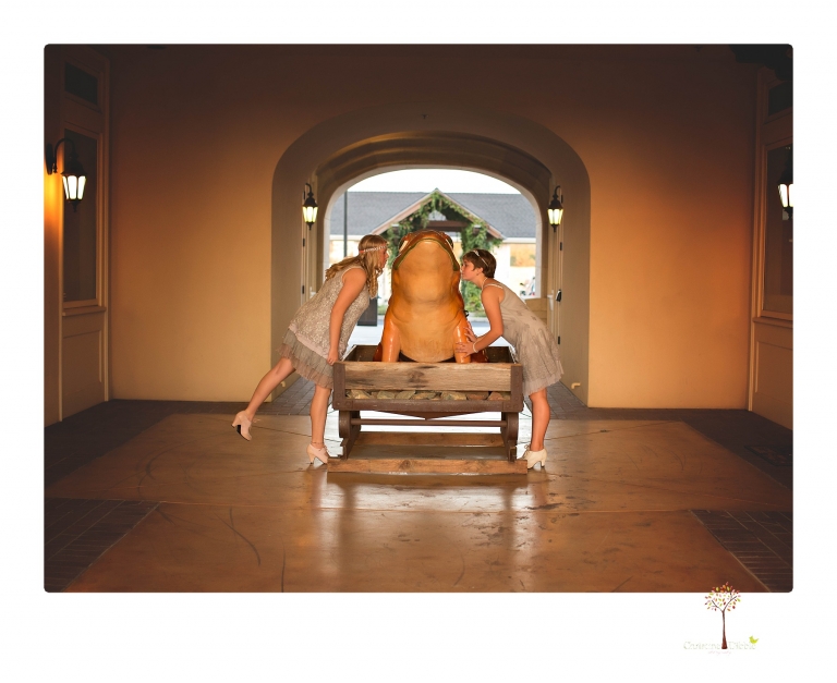 Sonora senior photographer Christine Dibble Photography takes portraits of two cousins dressed as flappers in Copperopolis Town Square before one leaves for college.