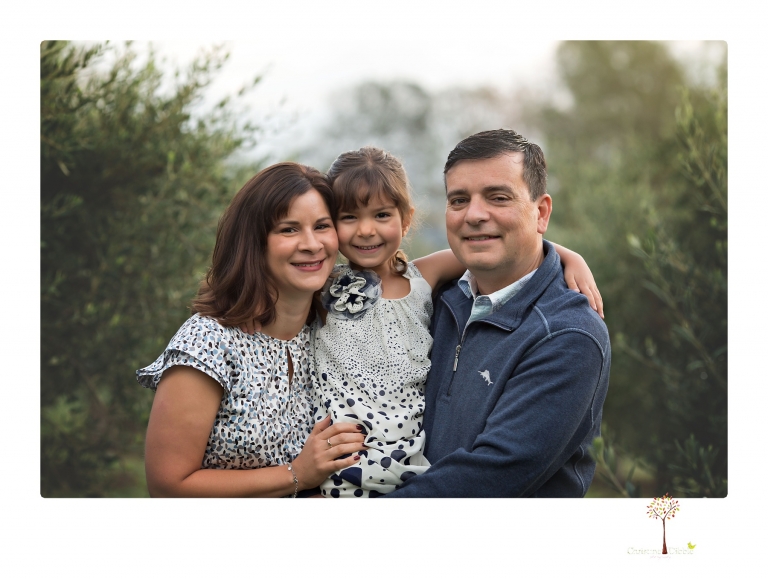 Sonora family portrait photographer Christine Dibble Photography takes Fall family portraits among the olive trees during a morning session at Hurst Ranch.