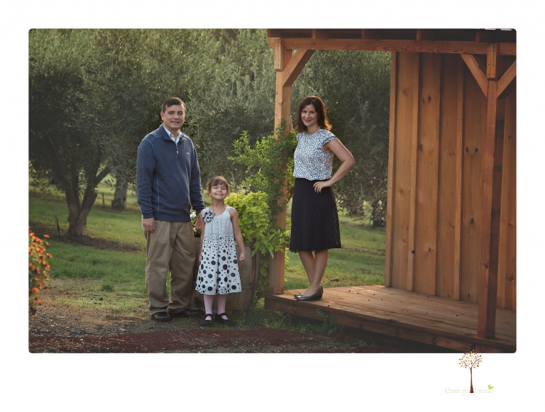 Sonora family portrait photographer Christine Dibble Photography takes Fall family portraits among the olive trees during a morning session at Hurst Ranch.