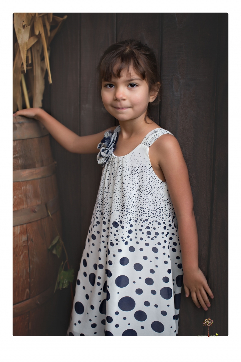 Sonora family portrait photographer Christine Dibble Photography takes Fall family portraits among the olive trees during a morning session at Hurst Ranch.