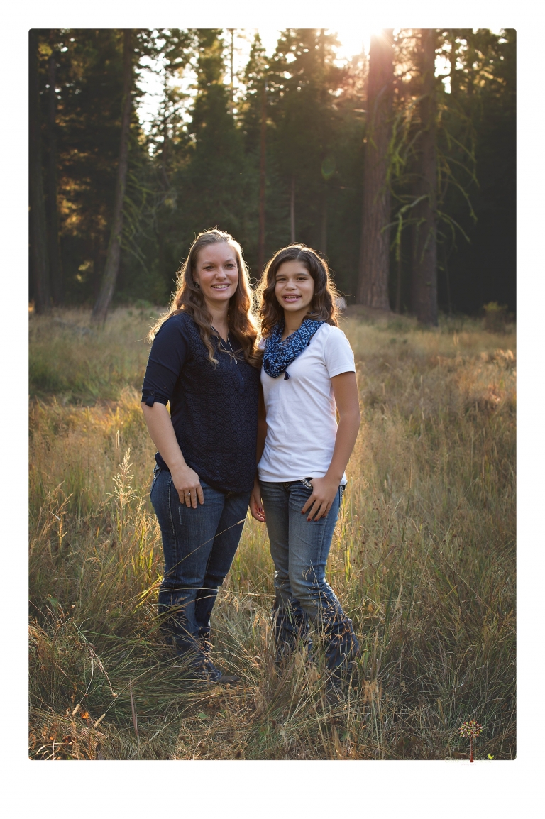 Sonora photographer Christine Dibble Photography takes family portraits at Pinecrest Lake in a golden lit field and on the beach.