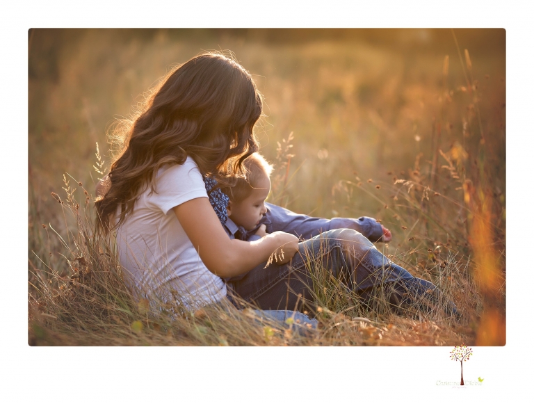 Sonora photographer Christine Dibble Photography takes family portraits at Pinecrest Lake in a golden lit field and on the beach.