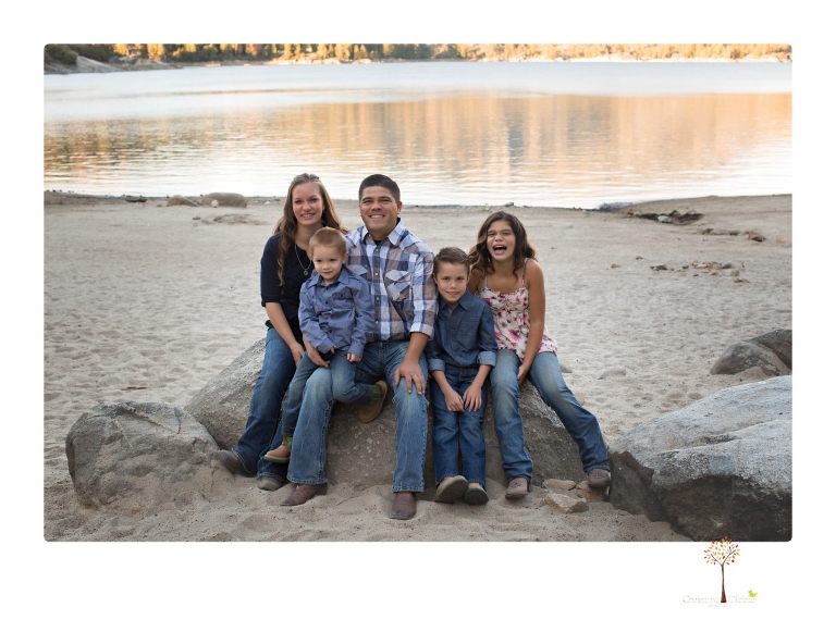 Sonora photographer Christine Dibble Photography takes family portraits at Pinecrest Lake in a golden lit field and on the beach.