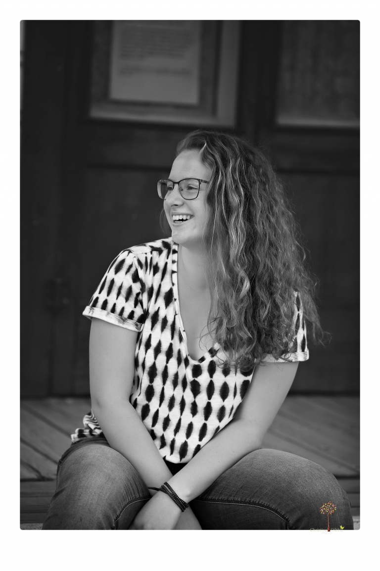 Sonora and Summerville High senior portrait photographer Christine Dibble Photography takes senior portraits of a Summerville High senior girl in Columbia State Historic Park with her moped and Edelweiss necklace.