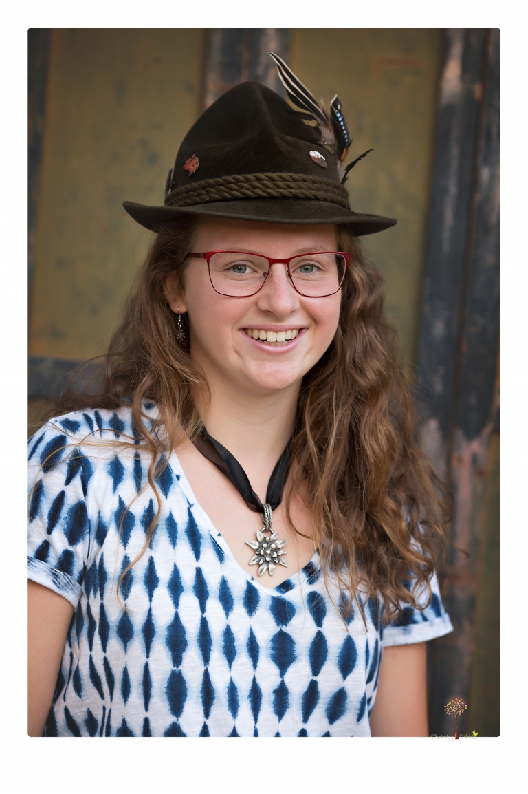 Sonora and Summerville High senior portrait photographer Christine Dibble Photography takes senior portraits of a Summerville High senior girl in Columbia State Historic Park with her moped and Edelweiss necklace.