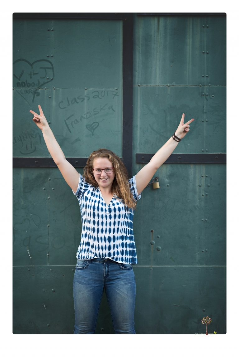 Sonora and Summerville High senior portrait photographer Christine Dibble Photography takes senior portraits of a Summerville High senior girl in Columbia State Historic Park with her moped and Edelweiss necklace.