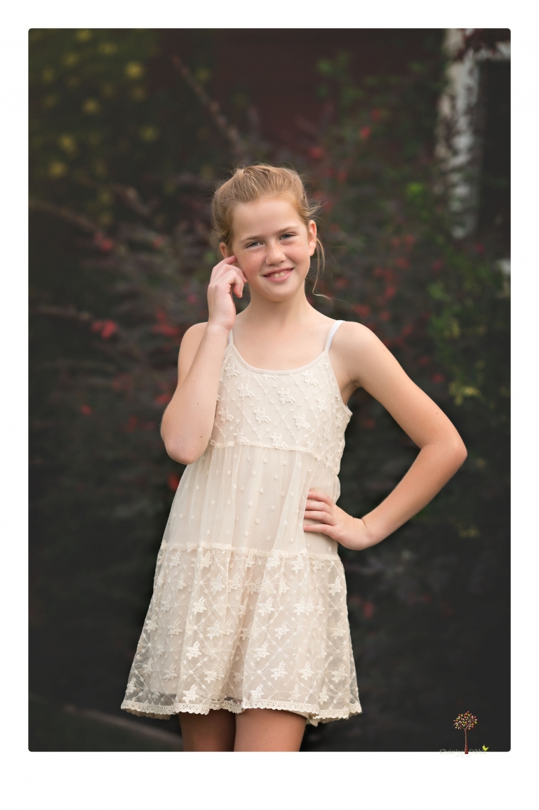 Sonora family photographer Christine Dibble Photography takes family portraits of a blended family in the backyard of their Tuolumne vacation home.