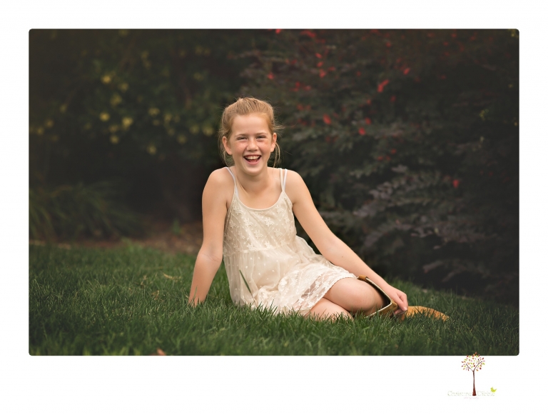 Sonora family photographer Christine Dibble Photography takes family portraits of a blended family in the backyard of their Tuolumne vacation home.