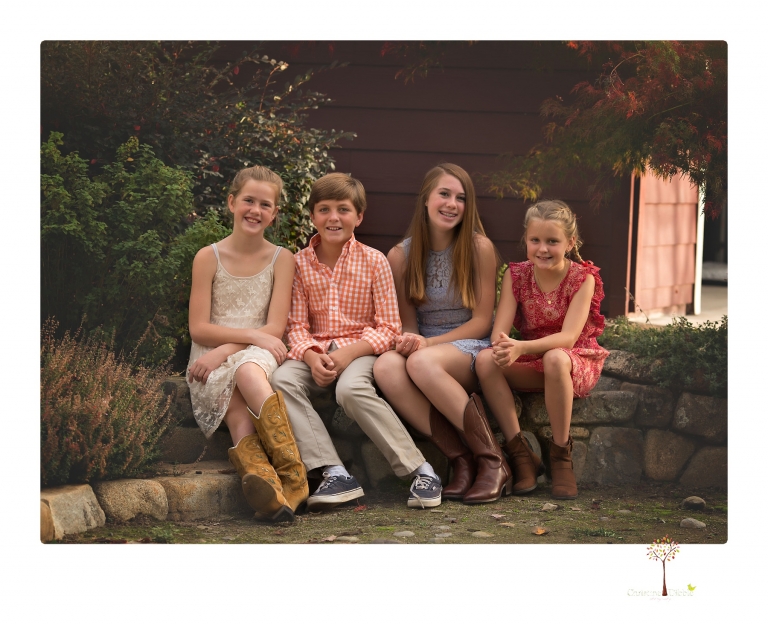 Sonora family photographer Christine Dibble Photography takes family portraits of a blended family in the backyard of their Tuolumne vacation home.