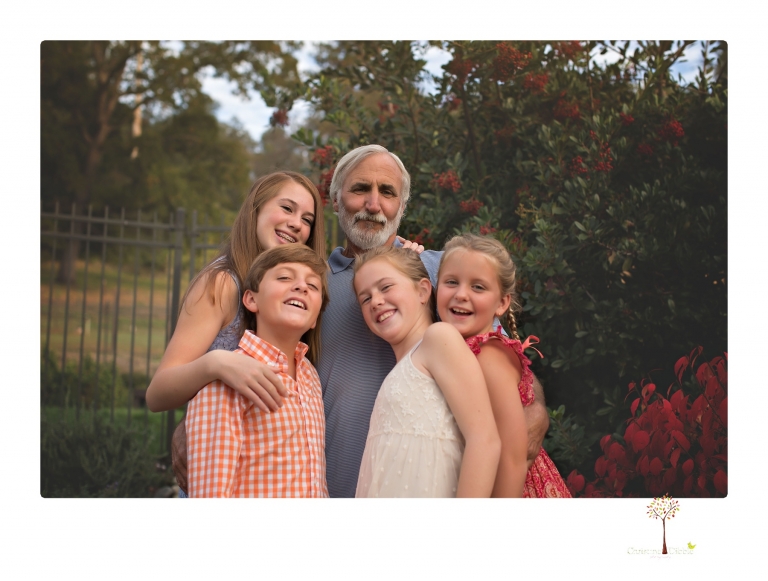 Sonora family photographer Christine Dibble Photography takes family portraits of a blended family in the backyard of their Tuolumne vacation home.
