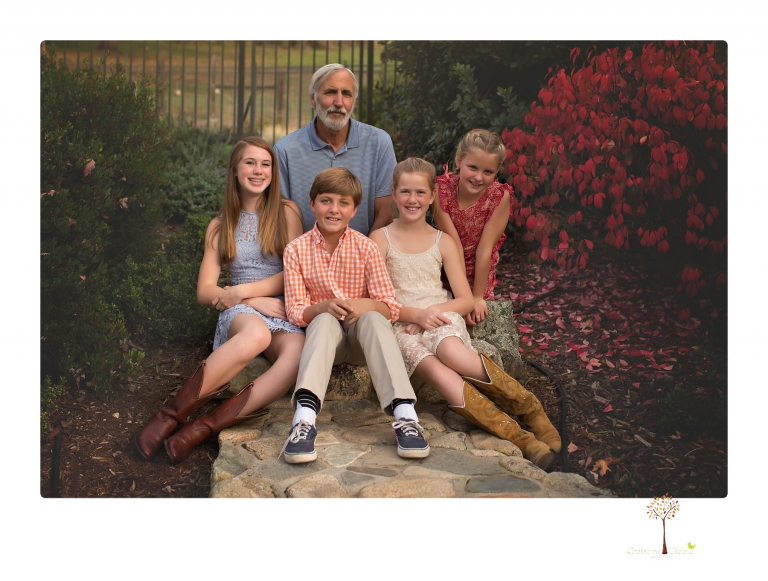 Sonora family photographer Christine Dibble Photography takes family portraits of a blended family in the backyard of their Tuolumne vacation home.