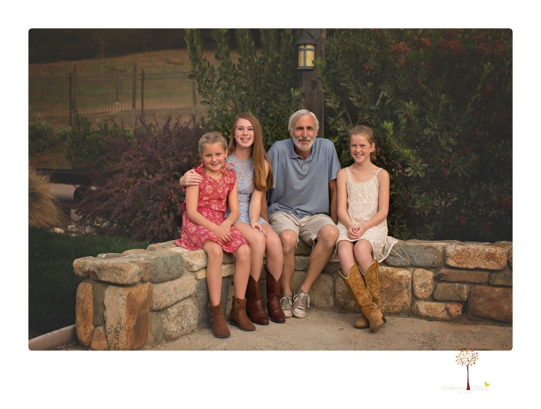 Sonora family photographer Christine Dibble Photography takes family portraits of a blended family in the backyard of their Tuolumne vacation home.