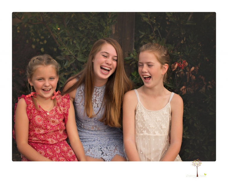 Sonora family photographer Christine Dibble Photography takes family portraits of a blended family in the backyard of their Tuolumne vacation home.