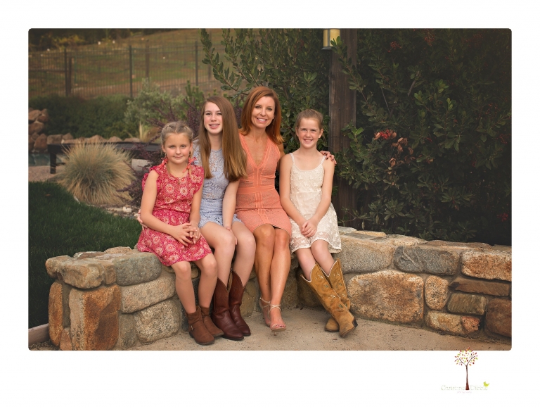 Sonora family photographer Christine Dibble Photography takes family portraits of a blended family in the backyard of their Tuolumne vacation home.