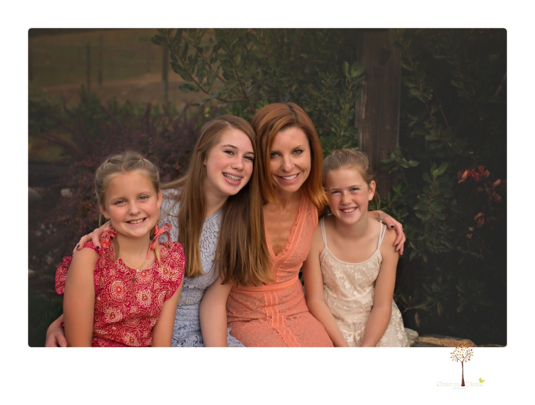 Sonora family photographer Christine Dibble Photography takes family portraits of a blended family in the backyard of their Tuolumne vacation home.