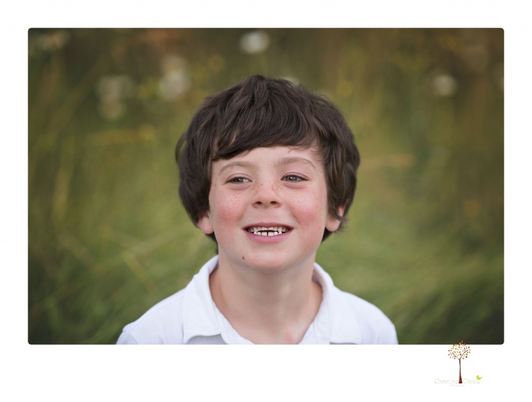 Sonora family photographer Christine Dibble Photography takes sunset family portraits in a field at Lake Tahoe in the summer.