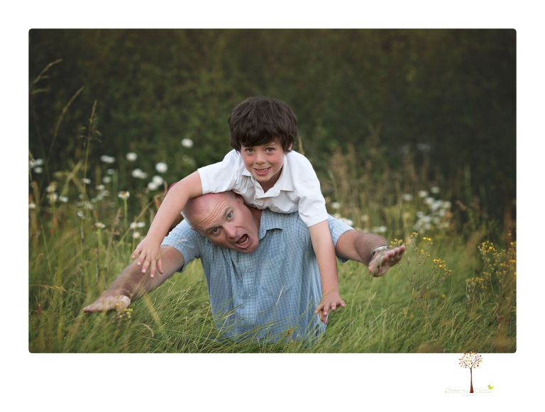 Sonora family photographer Christine Dibble Photography takes sunset family portraits in a field at Lake Tahoe in the summer.