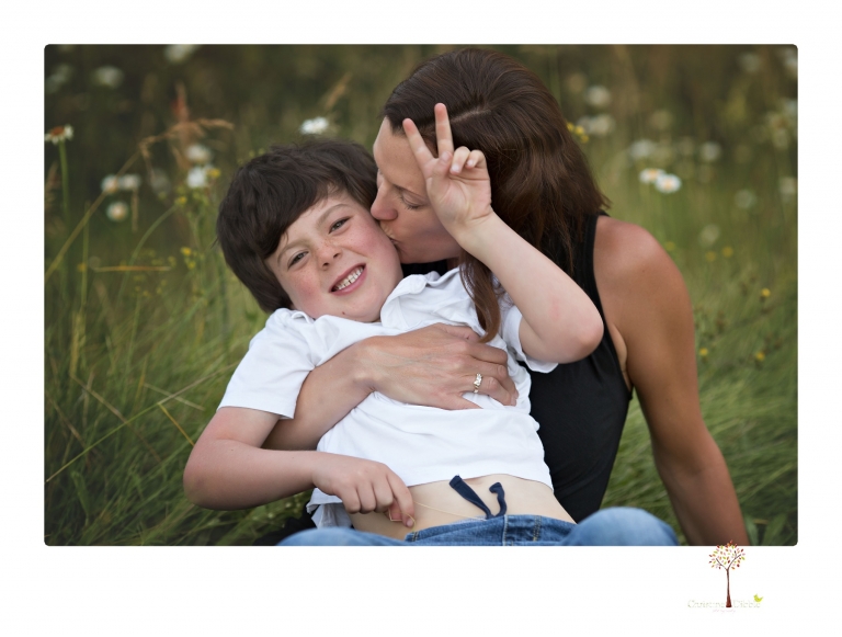 Sonora family photographer Christine Dibble Photography takes sunset family portraits in a field at Lake Tahoe in the summer.