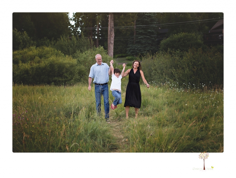 Sonora family photographer Christine Dibble Photography takes sunset family portraits in a field at Lake Tahoe in the summer.