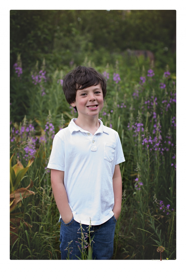 Sonora family photographer Christine Dibble Photography takes sunset family portraits in a field at Lake Tahoe in the summer.