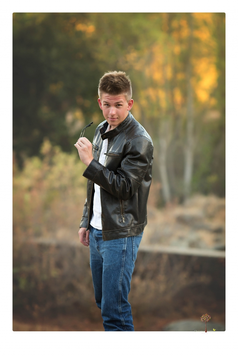 Summerville Senior Portrait photographer Christine Dibble of Sonora takes senior portraits of a boy in a kilt, a nerd scene, an explosion and a tuxedo at Knights Ferry.