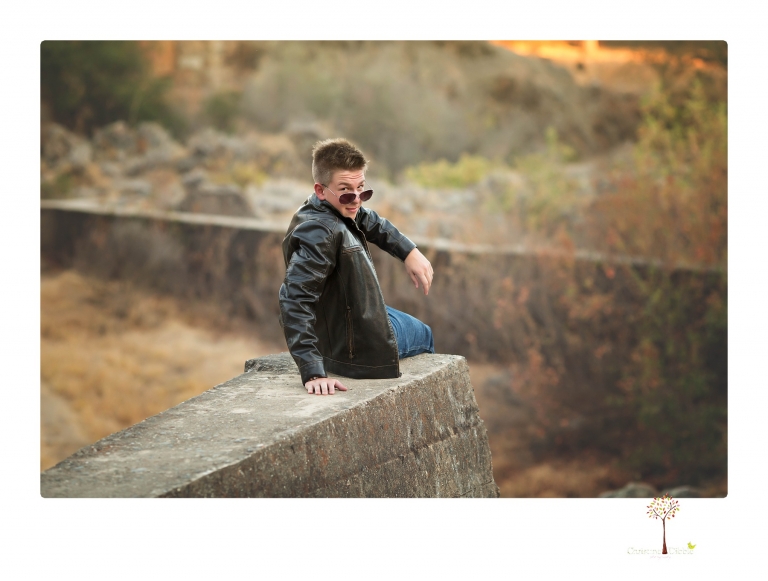 Summerville Senior Portrait photographer Christine Dibble of Sonora takes senior portraits of a boy in a kilt, a nerd scene, an explosion and a tuxedo at Knights Ferry.