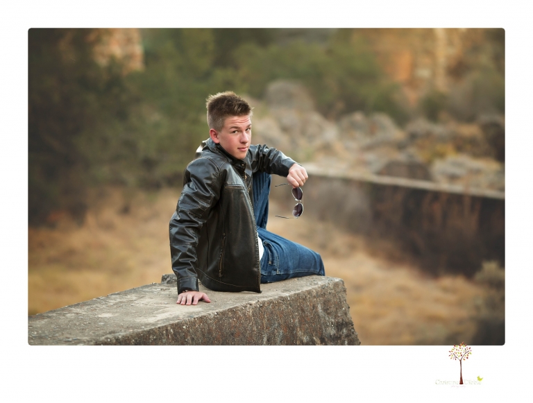 Summerville Senior Portrait photographer Christine Dibble of Sonora takes senior portraits of a boy in a kilt, a nerd scene, an explosion and a tuxedo at Knights Ferry.