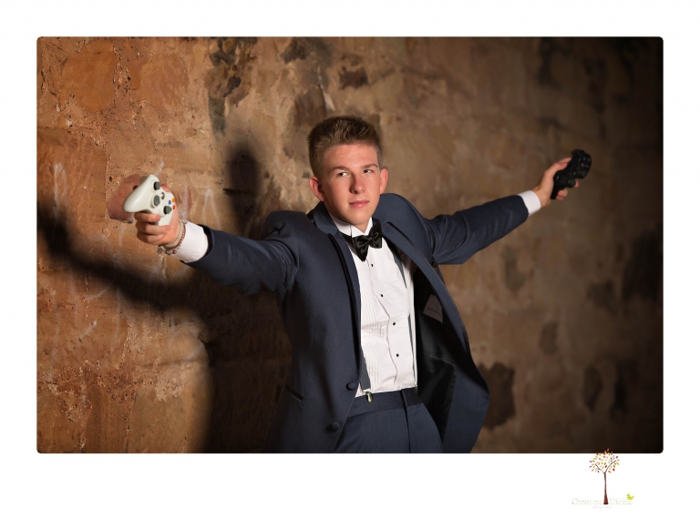 Summerville Senior Portrait photographer Christine Dibble of Sonora takes senior portraits of a boy in a kilt, a nerd scene, an explosion and a tuxedo at Knights Ferry.