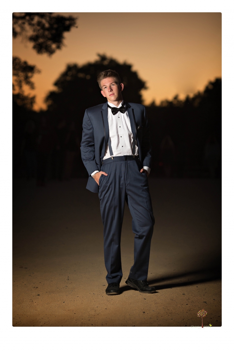 Summerville Senior Portrait photographer Christine Dibble of Sonora takes senior portraits of a boy in a kilt, a nerd scene, an explosion and a tuxedo at Knights Ferry.