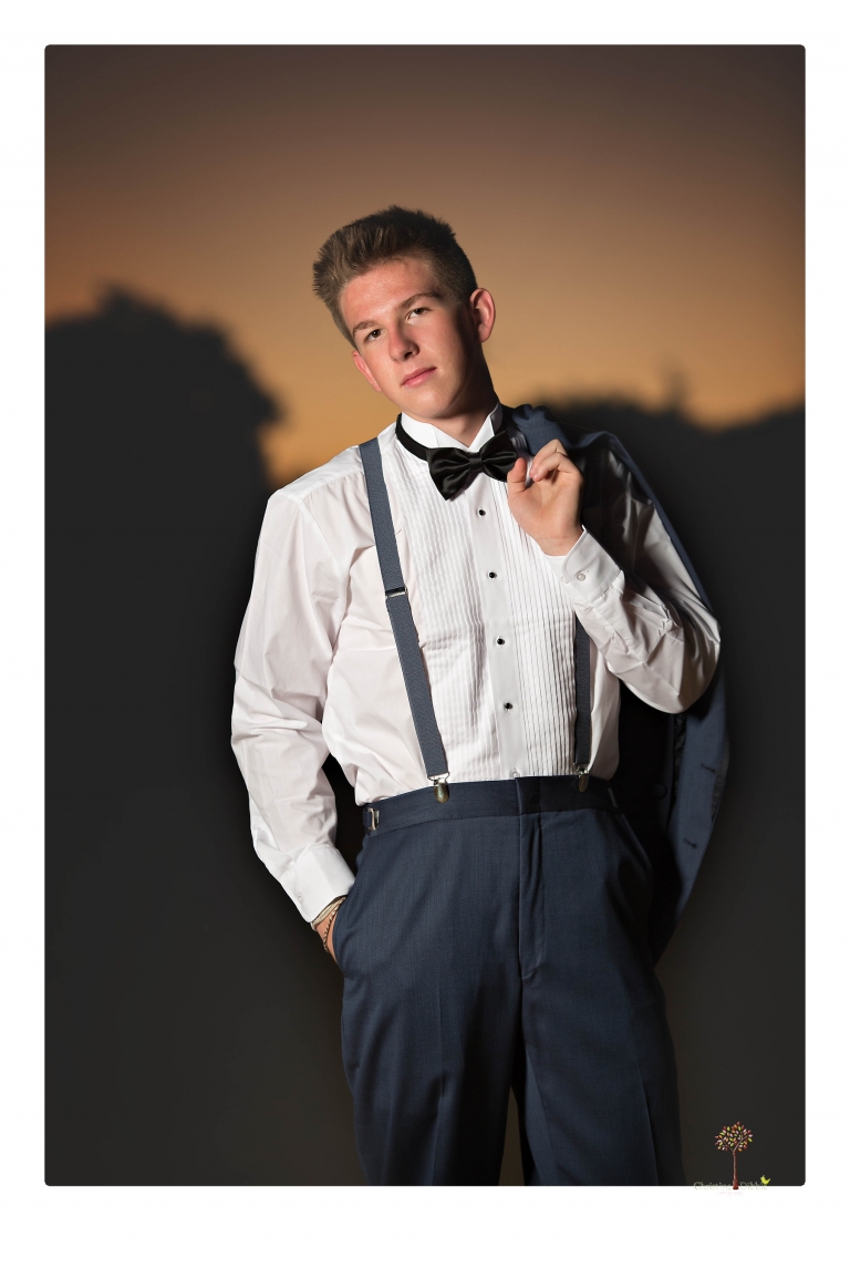 Summerville Senior Portrait photographer Christine Dibble of Sonora takes senior portraits of a boy in a kilt, a nerd scene, an explosion and a tuxedo at Knights Ferry.