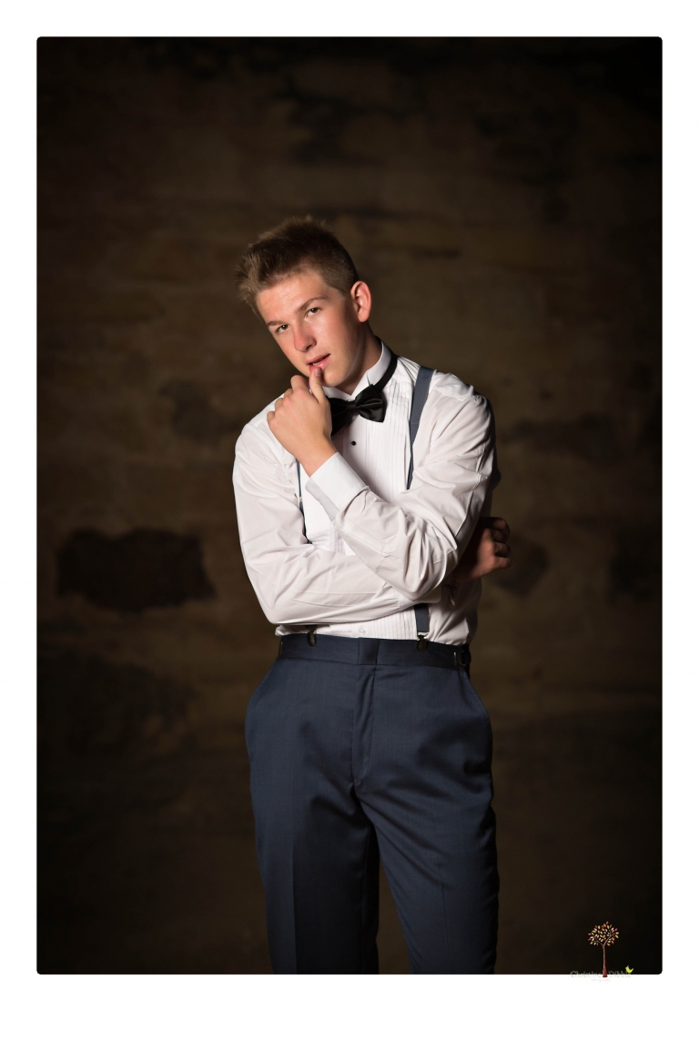 Summerville Senior Portrait photographer Christine Dibble of Sonora takes senior portraits of a boy in a kilt, a nerd scene, an explosion and a tuxedo at Knights Ferry.